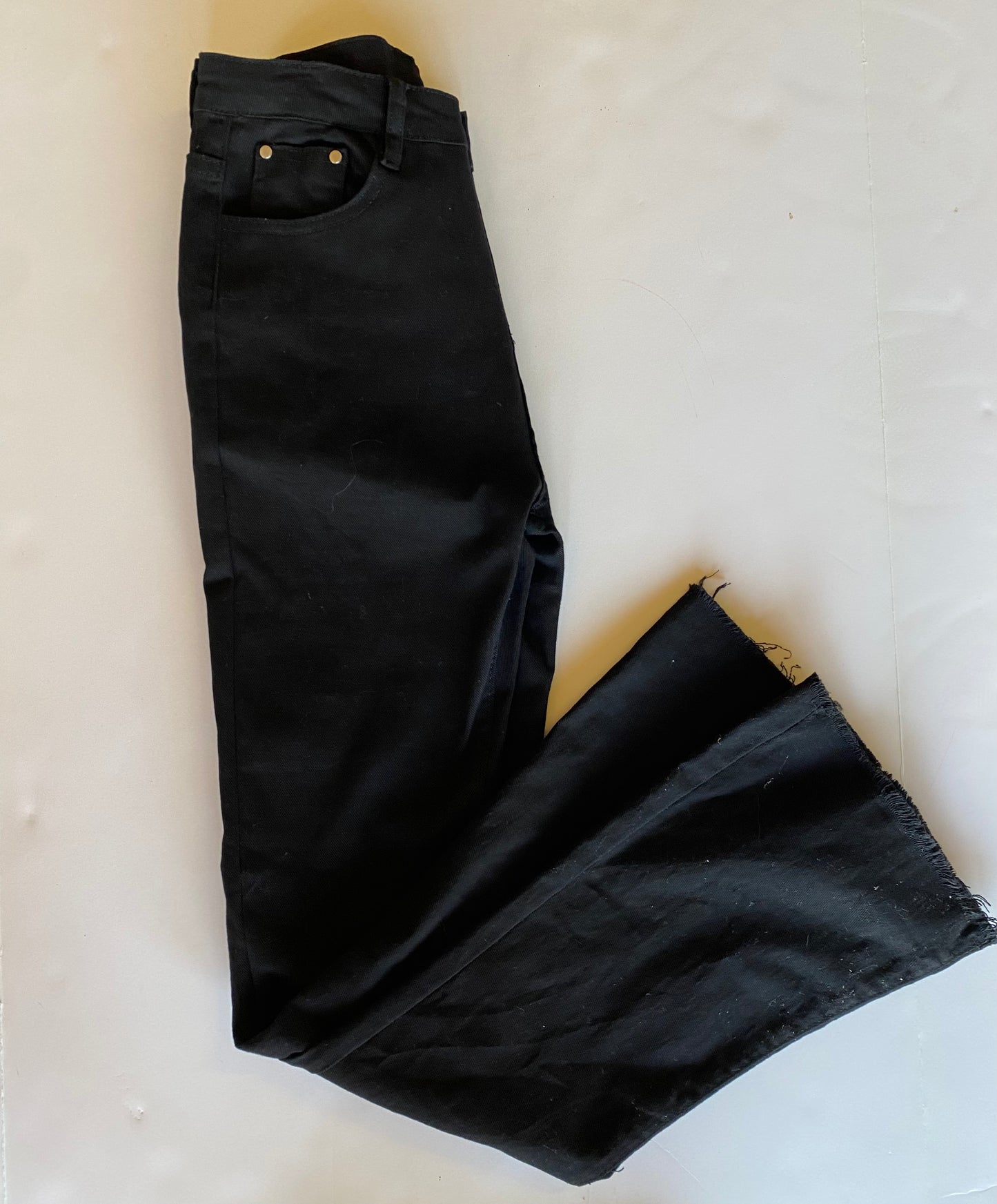 Black raw hem flare denim Jeans