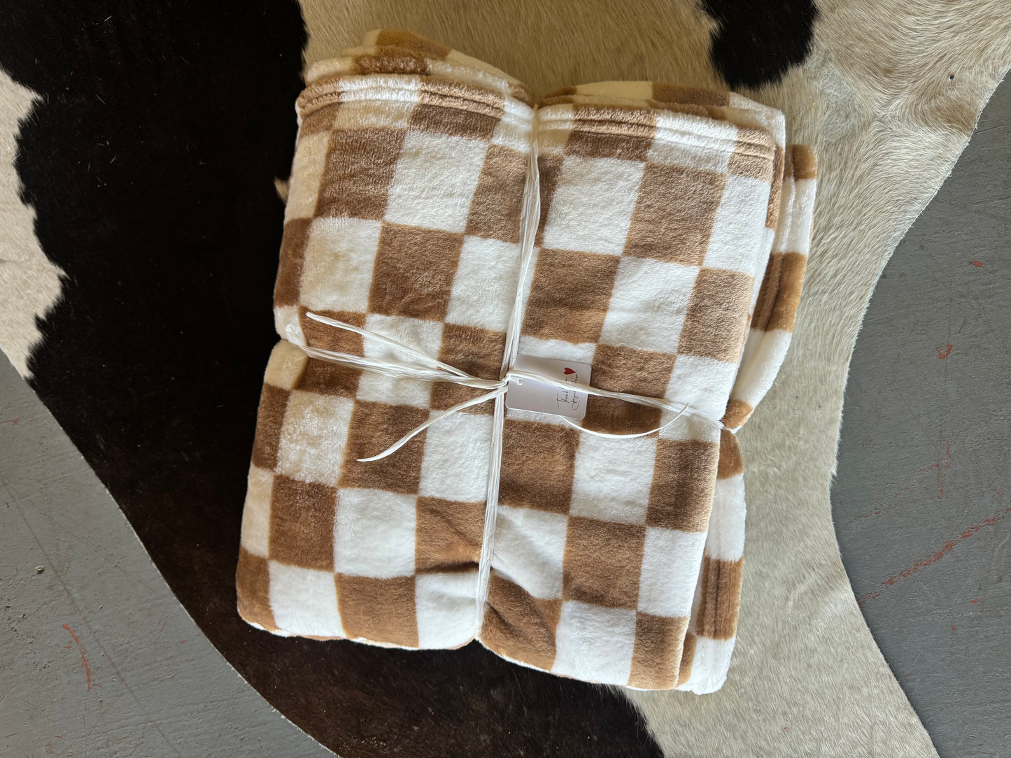 Brown checkered throw blanket