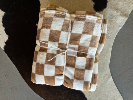 Brown checkered throw blanket